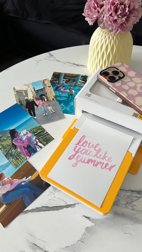 Instagram post by @laurys.lovelygallery for Kodak. Caption reads: [...] memories in your camera roll... ☀️🎞️....