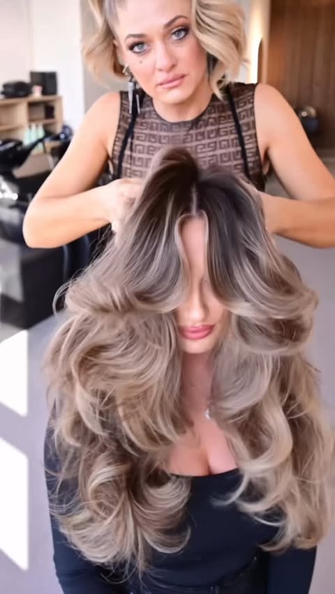 Instagram post by @ashleenormanhair for K18 Hair. Caption reads: [...] for questions TOUR Sponsored @k18hair....