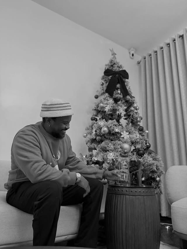 Instagram post by @realshinski for Johnnie Walker. Caption reads: #ad Happy Holidays to you and yours! Be safe....