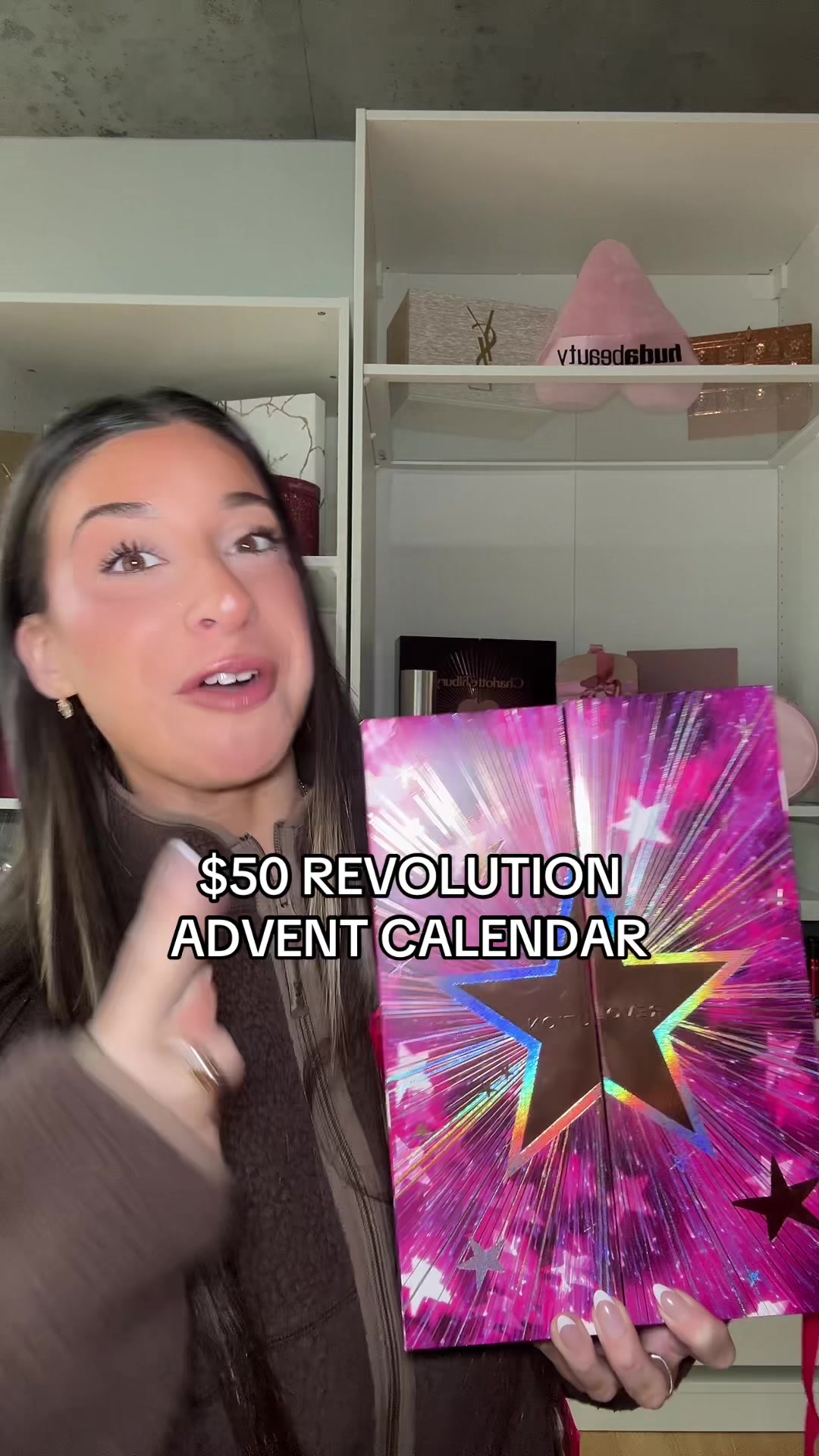 TikTok post by @allierosss for Makeup Revolution. Caption reads: $50 @Makeup Revolution ADVENT CALENDAR PT 2?!?!?....