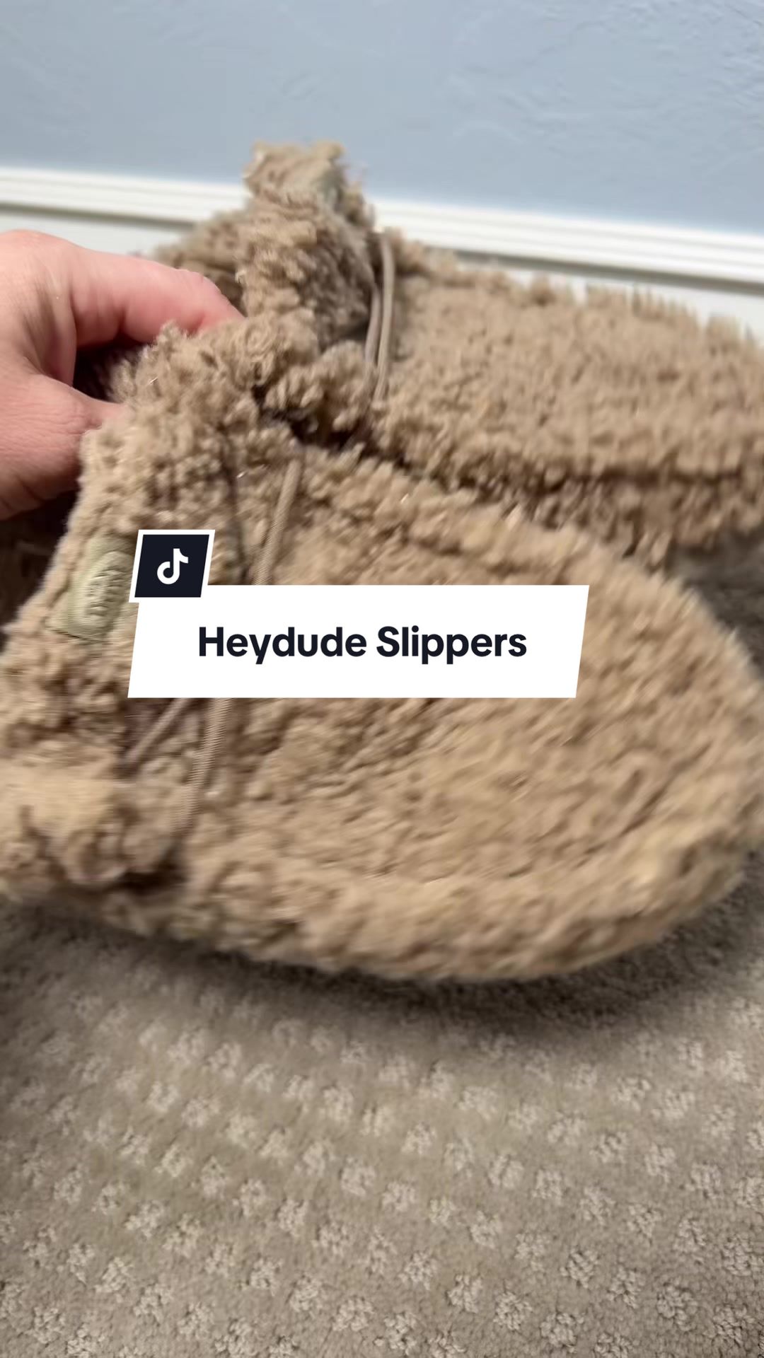 TikTok post by @emndadventures for HEYDUDE. Caption reads: @HeyDude Slipper season has arrived!! [...].
