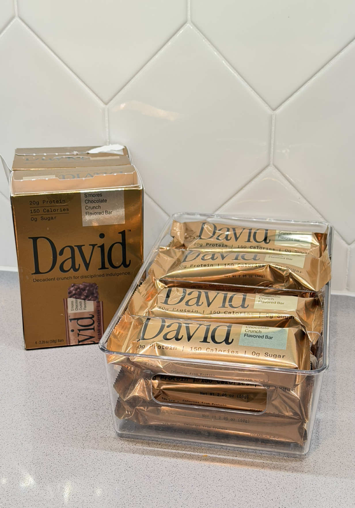 TikTok post by @christinebbbroker for David Protein. Caption reads: @David Protein is my new go-to high-protein snack....