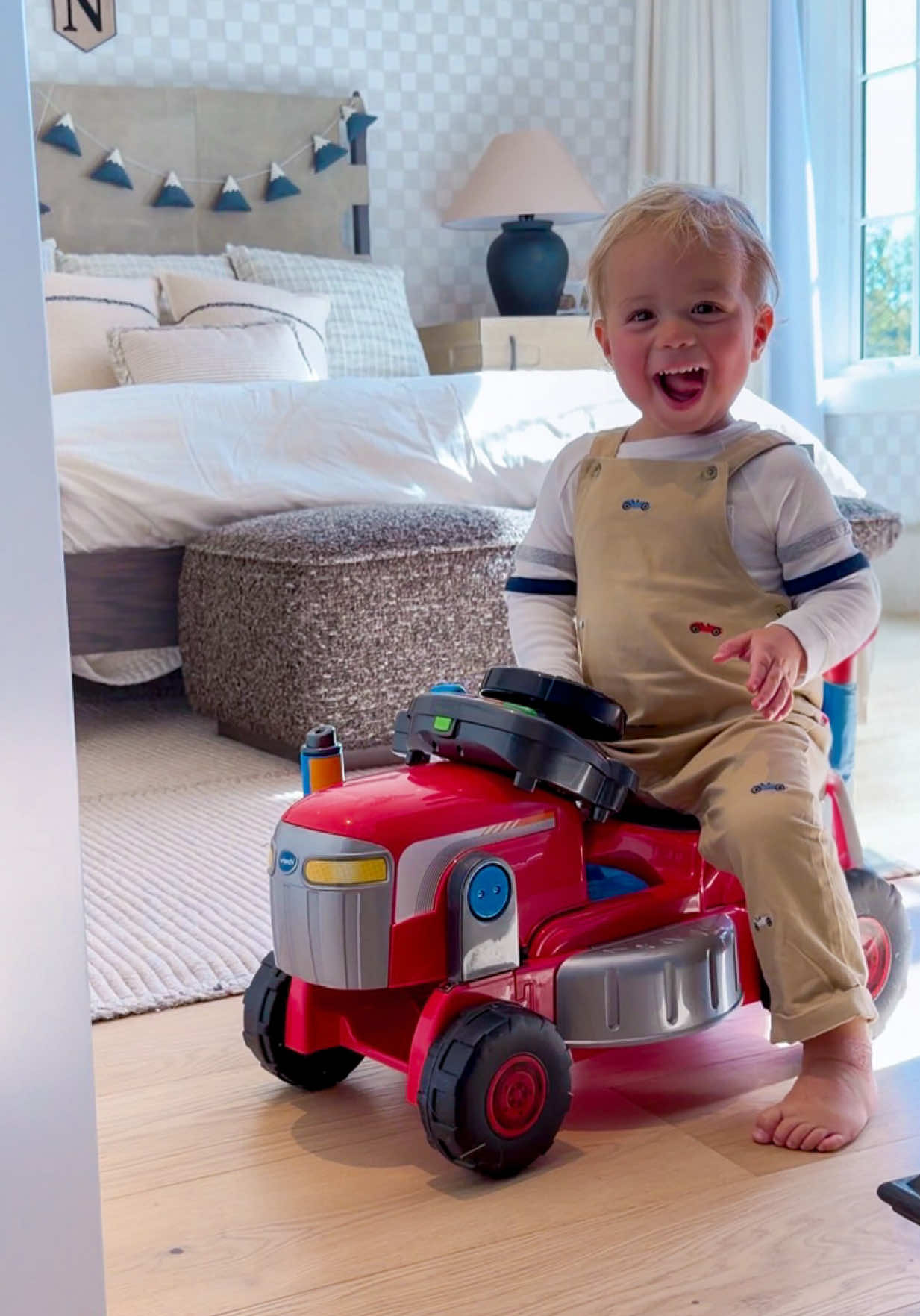 TikTok post by @emilyfauver for VTECH. Caption reads: [...] out here growing and mowing with my new....