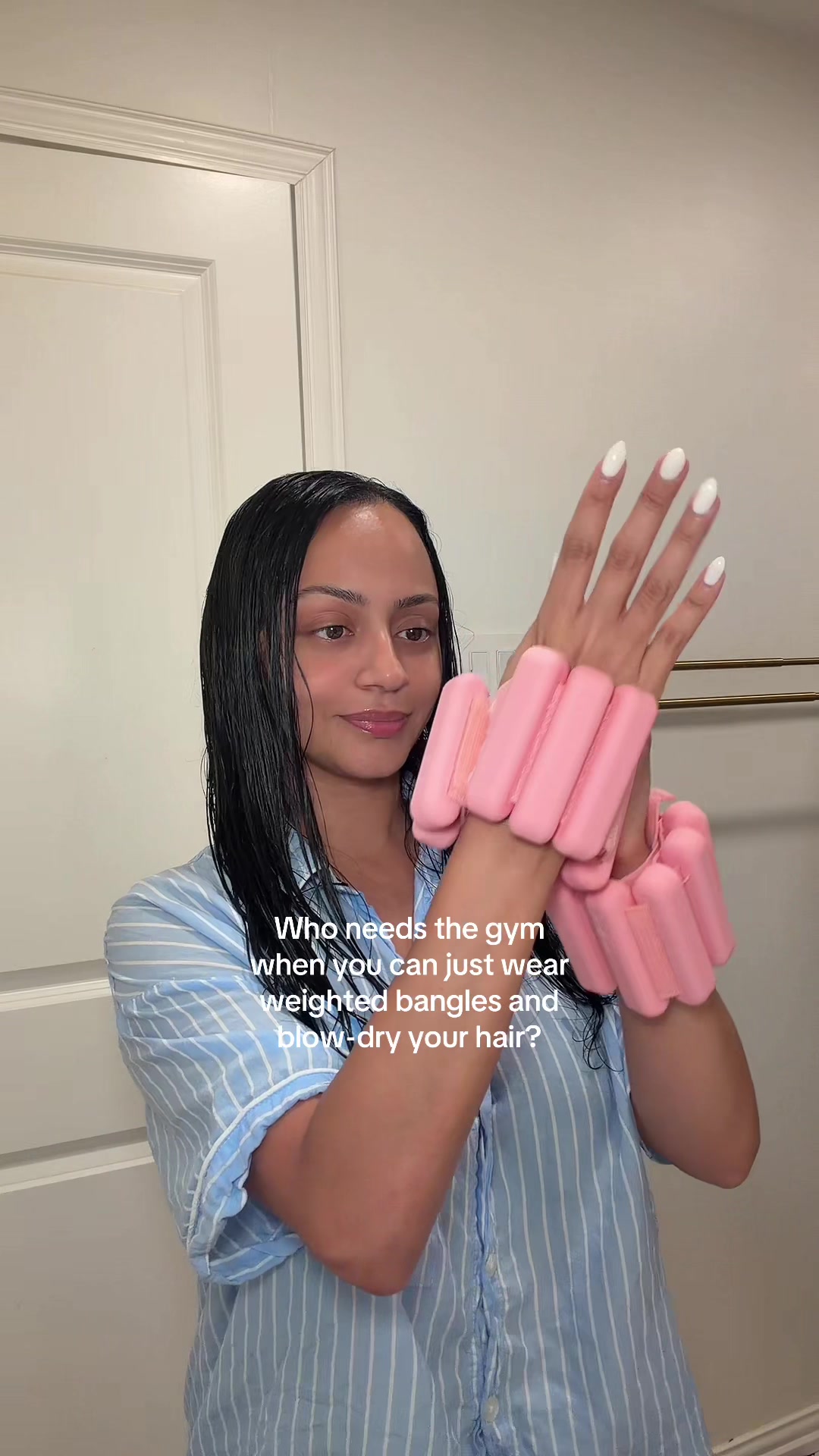 TikTok post by @amyjovel for Bala. Caption reads: @bala bangles & blow dryer #workout.