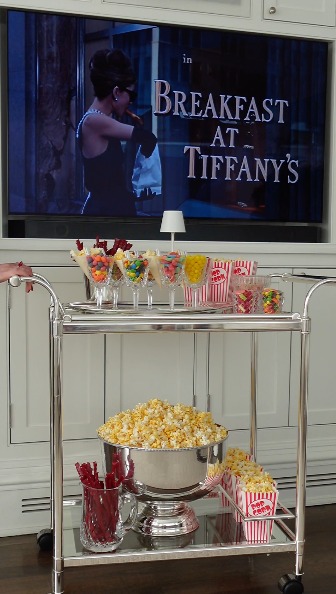 Instagram post by @girlllllhouse for DIRECTV. Caption reads: A Monday movie cart to cure January scaries 🍿🍬....