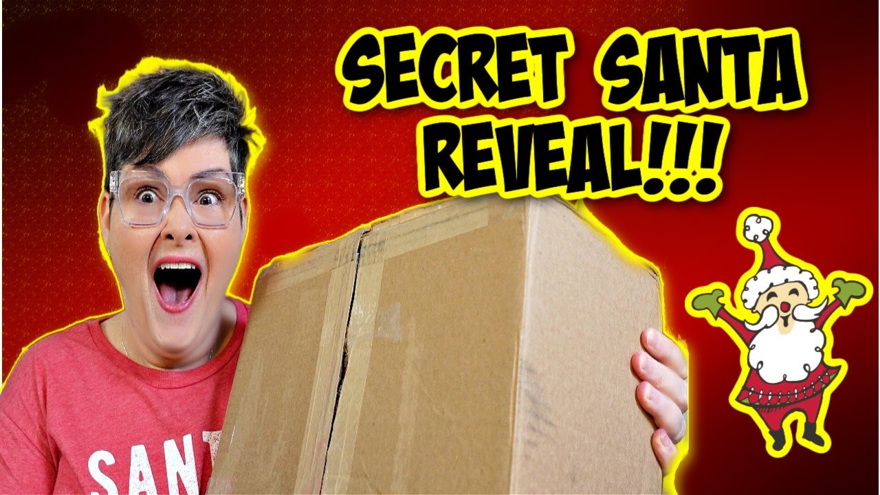 YouTube post by @WinnieBeeLV for biglots. Caption reads: Secret Santa Gifts Reveal!! You won't believe....
