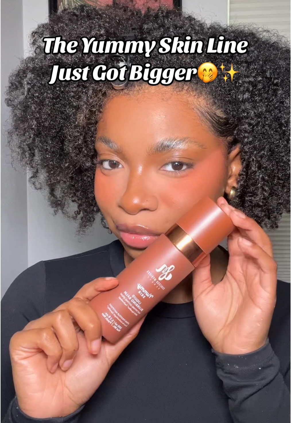 TikTok post by @ashleecookk for Danessa Myricks Beauty. Caption reads: This @DanessaMyricksBeauty spray has been in heavy....