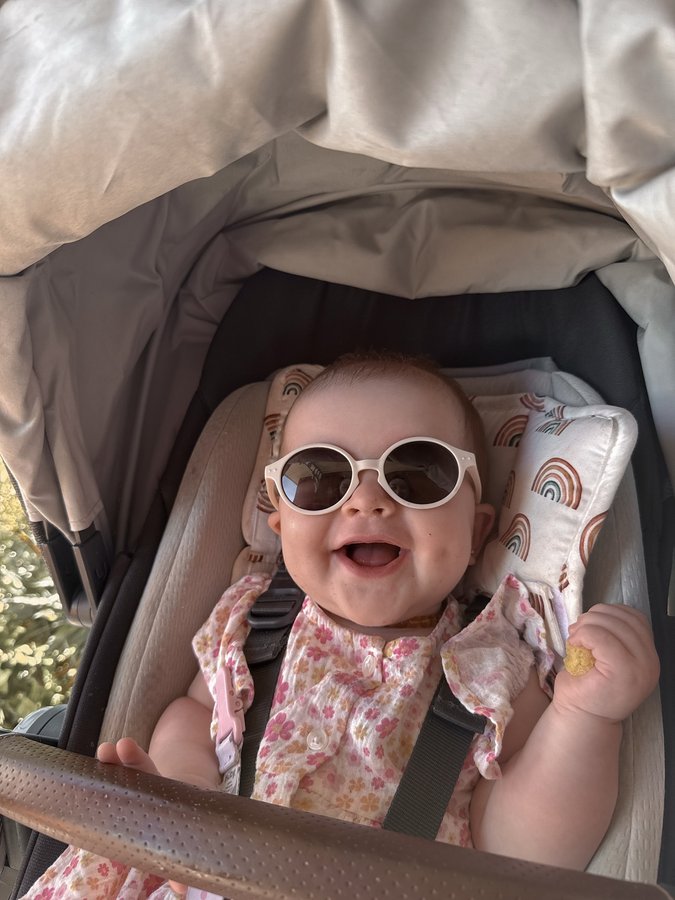 Instagram post by @chloe.jadeee_ for Polarised Baby Sunglasses. Caption reads: laineys the coolest kid on the block with her....