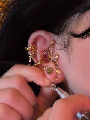 TikTok post by @alittlebitoftoni for Oufer Body Jewelry Official. Caption reads: Absolutely in love with this and so flexible too!....