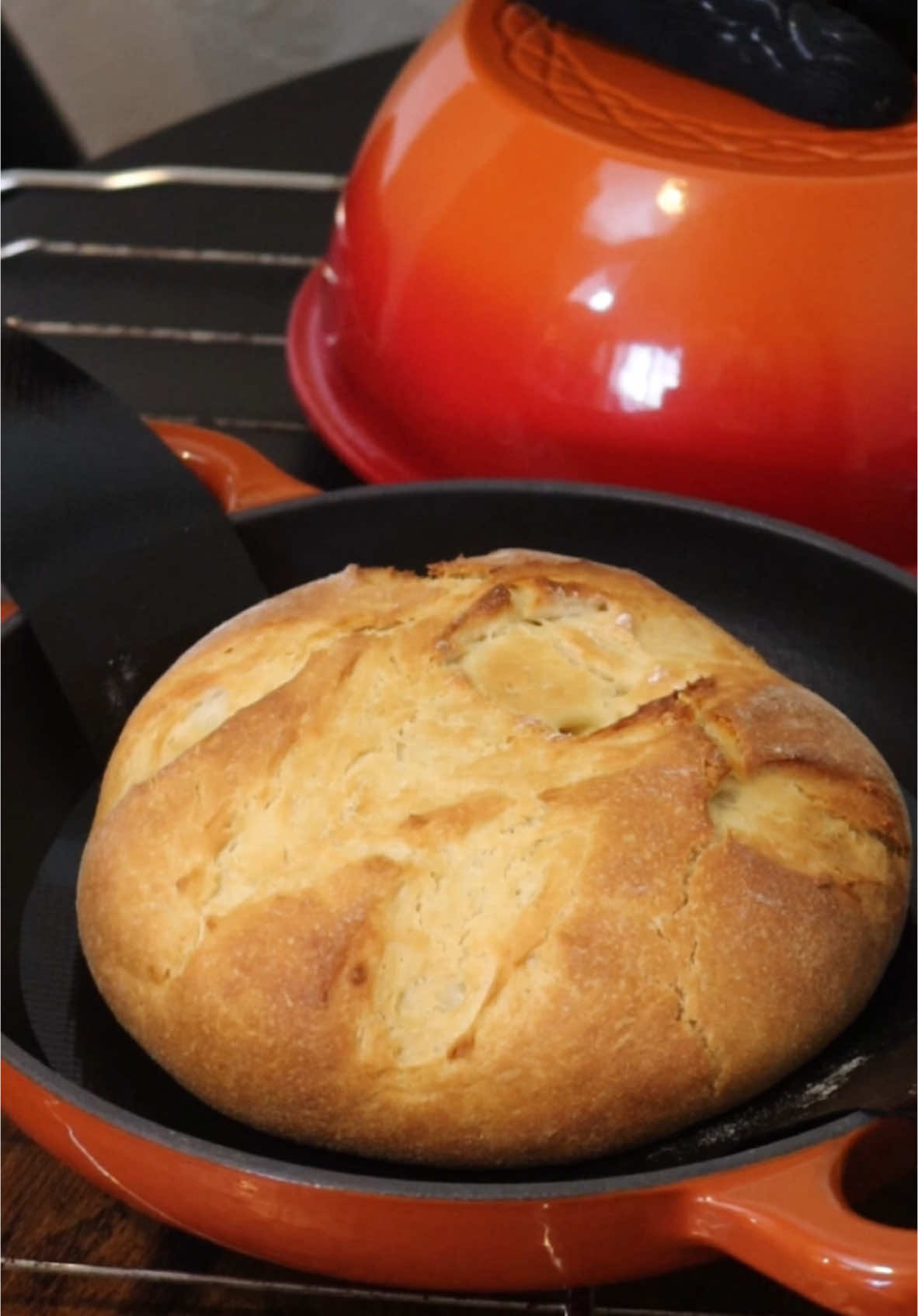 TikTok post by @moniquecesd for Krustic. Caption reads: [...] with my very first loaf baked in my new....