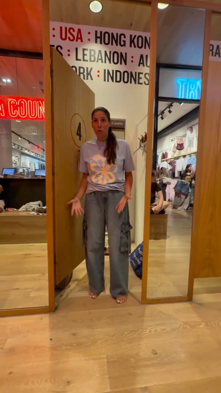 Instagram post by @thatmom_brittany for Garage Clothing. Caption reads: Back to school shopping 🙄 #backtoschool #shopping....