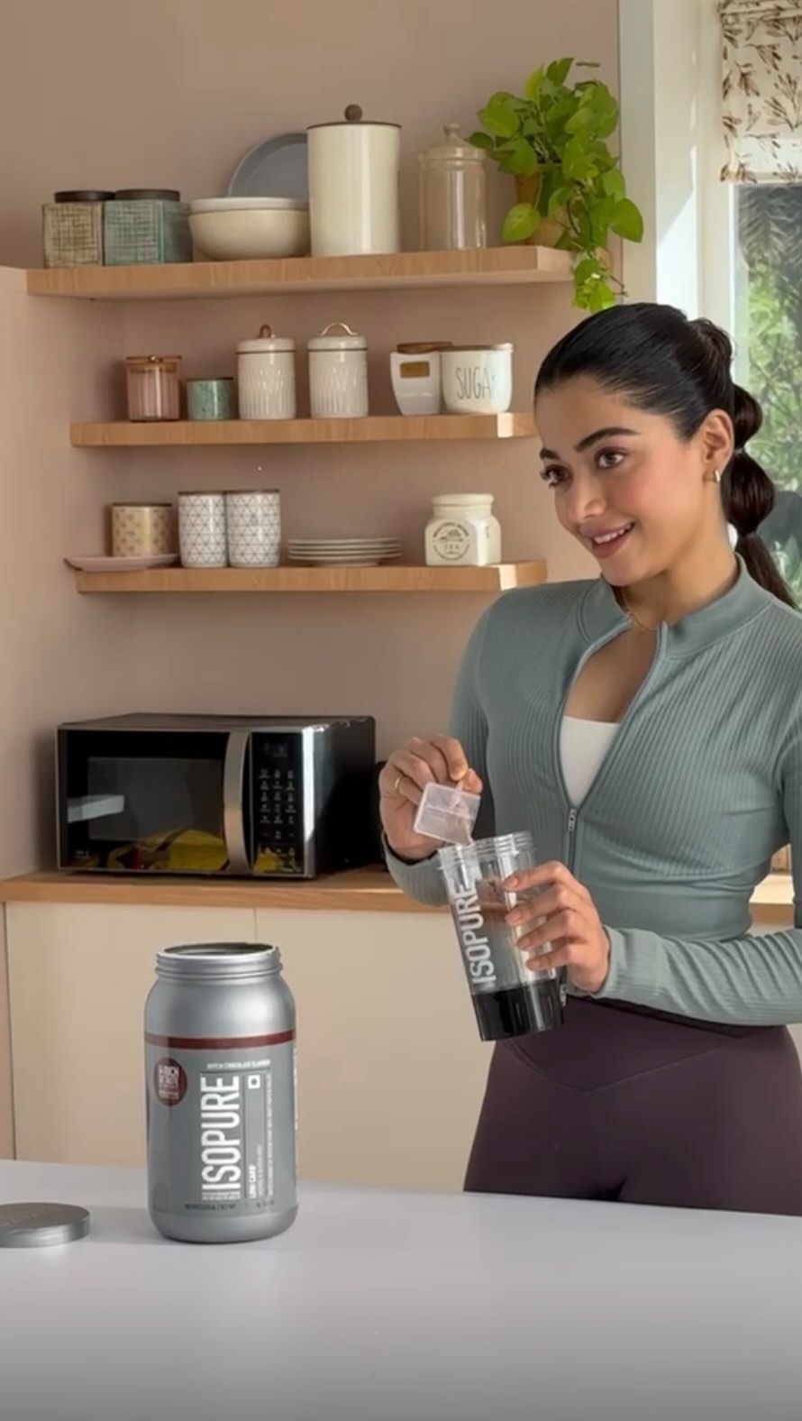 Instagram post by @souravv_roy_ for Isopure. Caption reads: #NewAd with @rashmika_mandanna x @isopure_india....