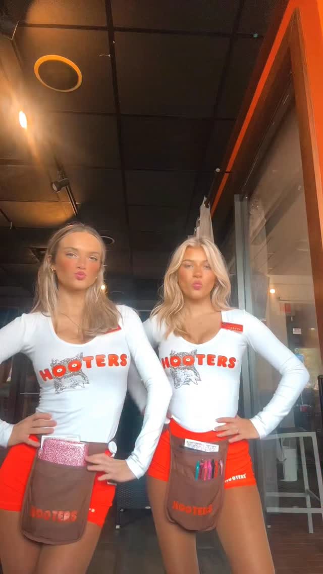 Instagram post by @uncensoredmiami305 for Hooters. Caption reads: We know….. Rain ☔️ 
But always ☀️ here at Hooters....