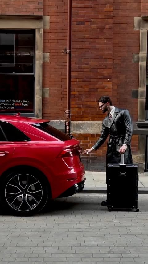 Instagram post by @alexsaunes for Audi. Caption reads: Loading up the Q8🧳 @audiuk ASMR - #audi #asmr....