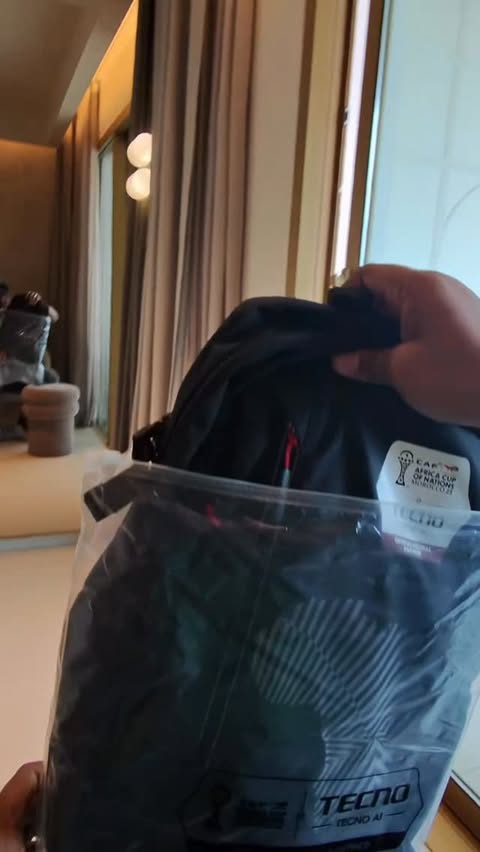 Instagram post by @ultimatekombo for Tecnomobile. Caption reads: Unboxing the TECNO AI back pack @tecnomobileng.
