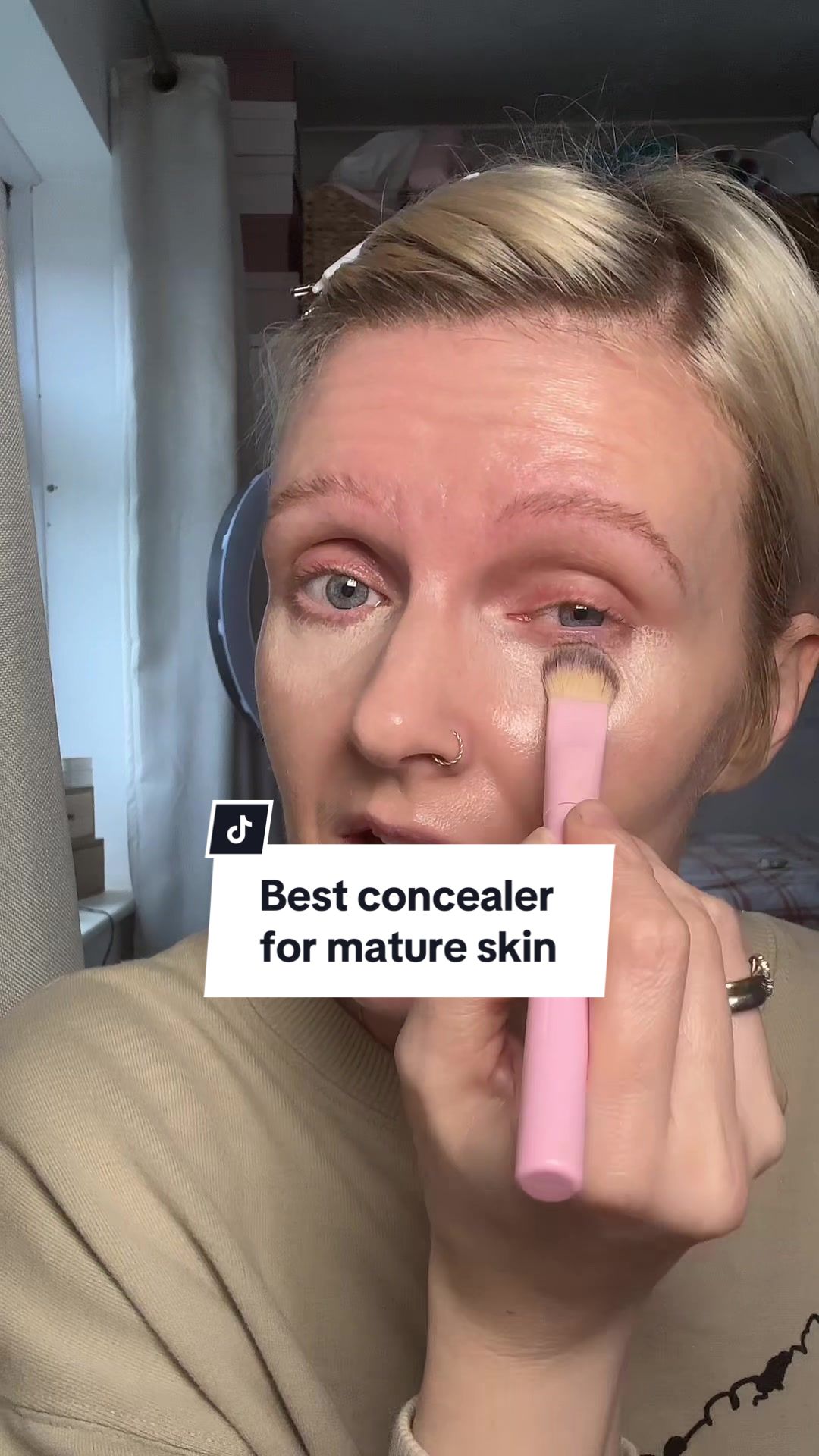 TikTok post by @40slifelou for Bellamianta. Caption reads: [...] #concealer #matureskin #makeupover40....