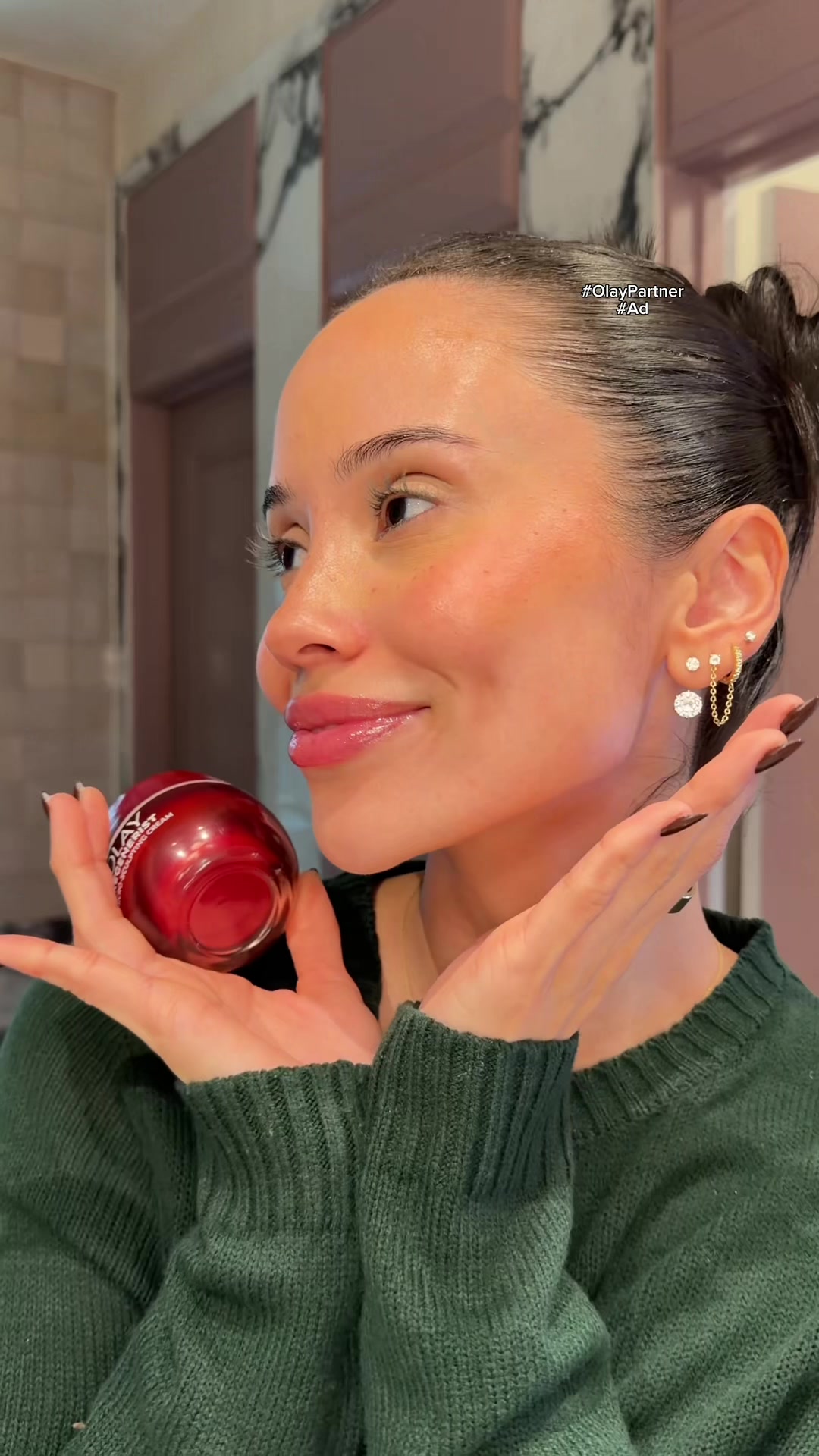 TikTok post by @stephaniepena__ for OLAY. Caption reads: #ad #OlayPartner The perfect addition to your....