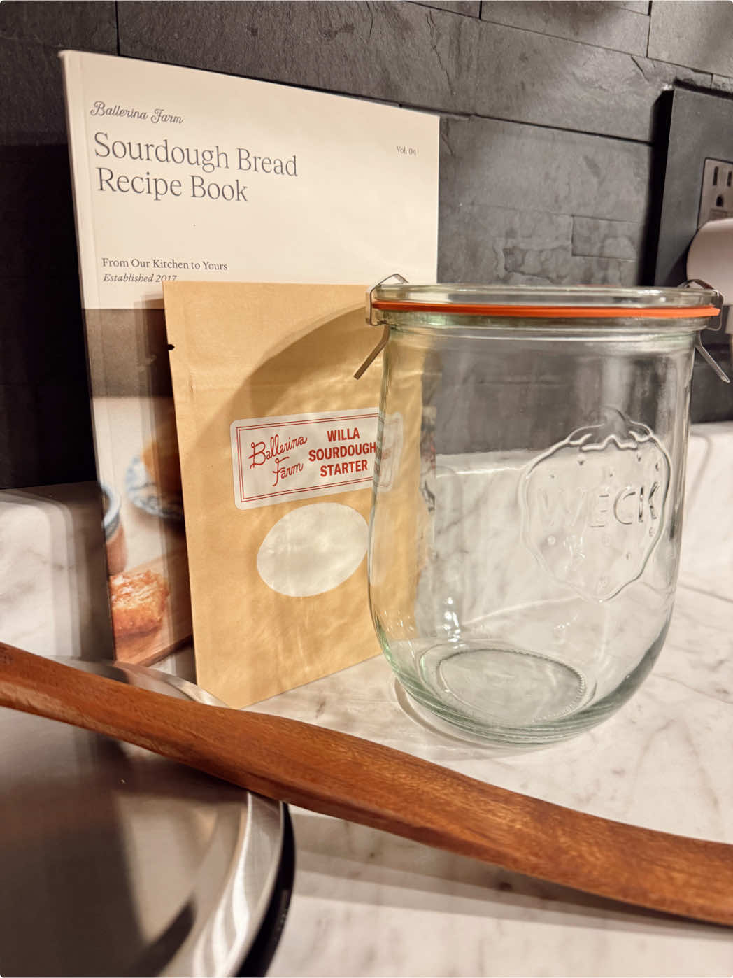 TikTok post by @harleyjadewood for Ballerina Farm. Caption reads: [...] kit! I can’t wait!! 😜 #sourdough....