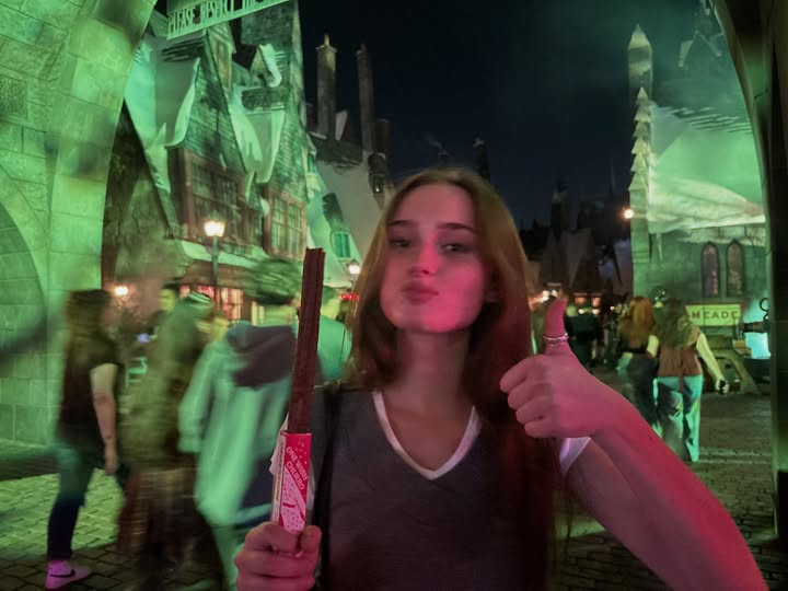 Instagram post by @audreygracemarshall for Halloween Horror Nights. Caption reads: Horror nights I love you and this churro so so so....