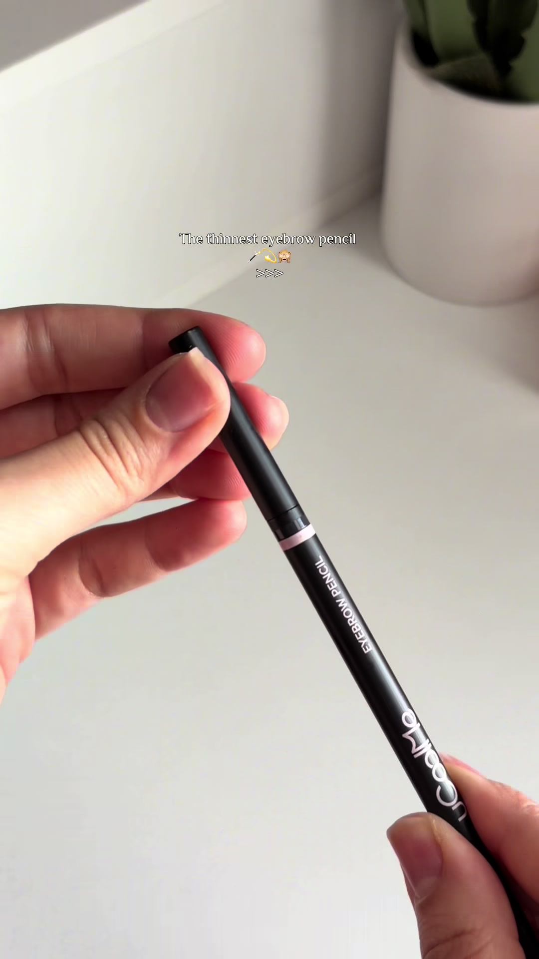 TikTok post by @.shopaholics_ for uCoolMe Lashes. Caption reads: It’s so thin 😳 @UCoolMeLashes @uCoolMe Makeup....