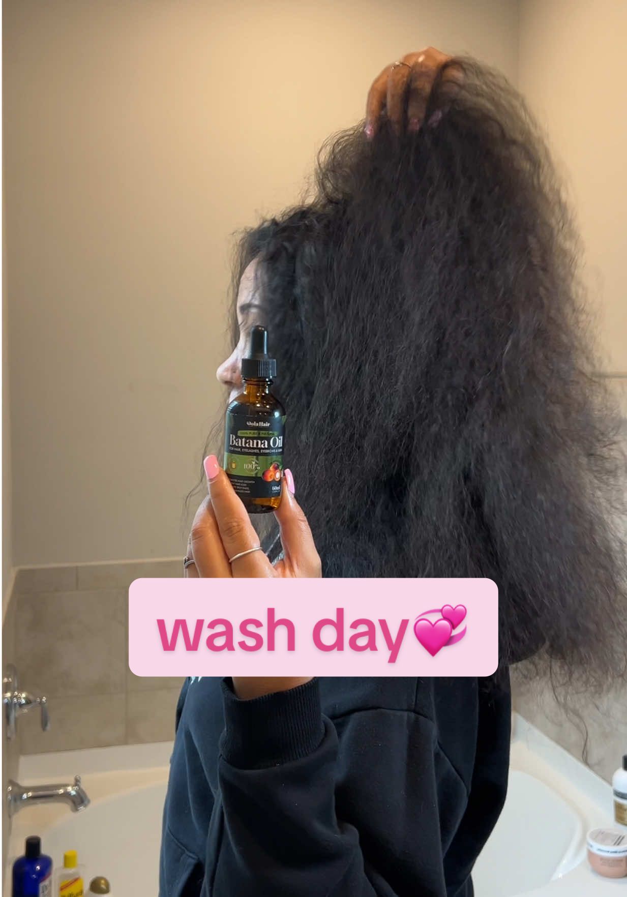 TikTok post by @alyinamichelle for Dolahair. Caption reads: wash day @Dolahair_marketing #washdayroutine....