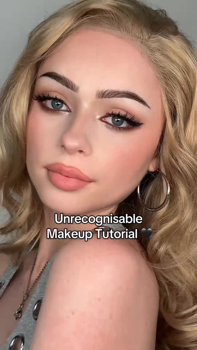 Instagram post by @s.ophiegracee for DearDahlia. Caption reads: UNRECOGNISABLE makeup tut 🖤 

Products from....