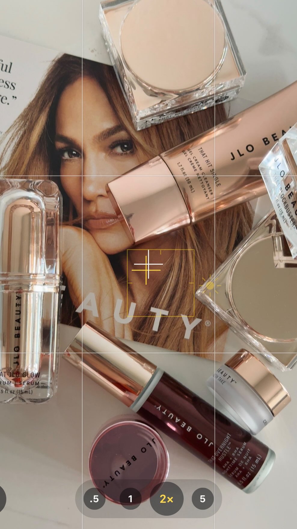 Instagram post by @ainura_rstmv for JLO BEAUTY. Caption reads: [...] with The Fresh&Flawless kit🫶🏻💘 @jlobeauty....