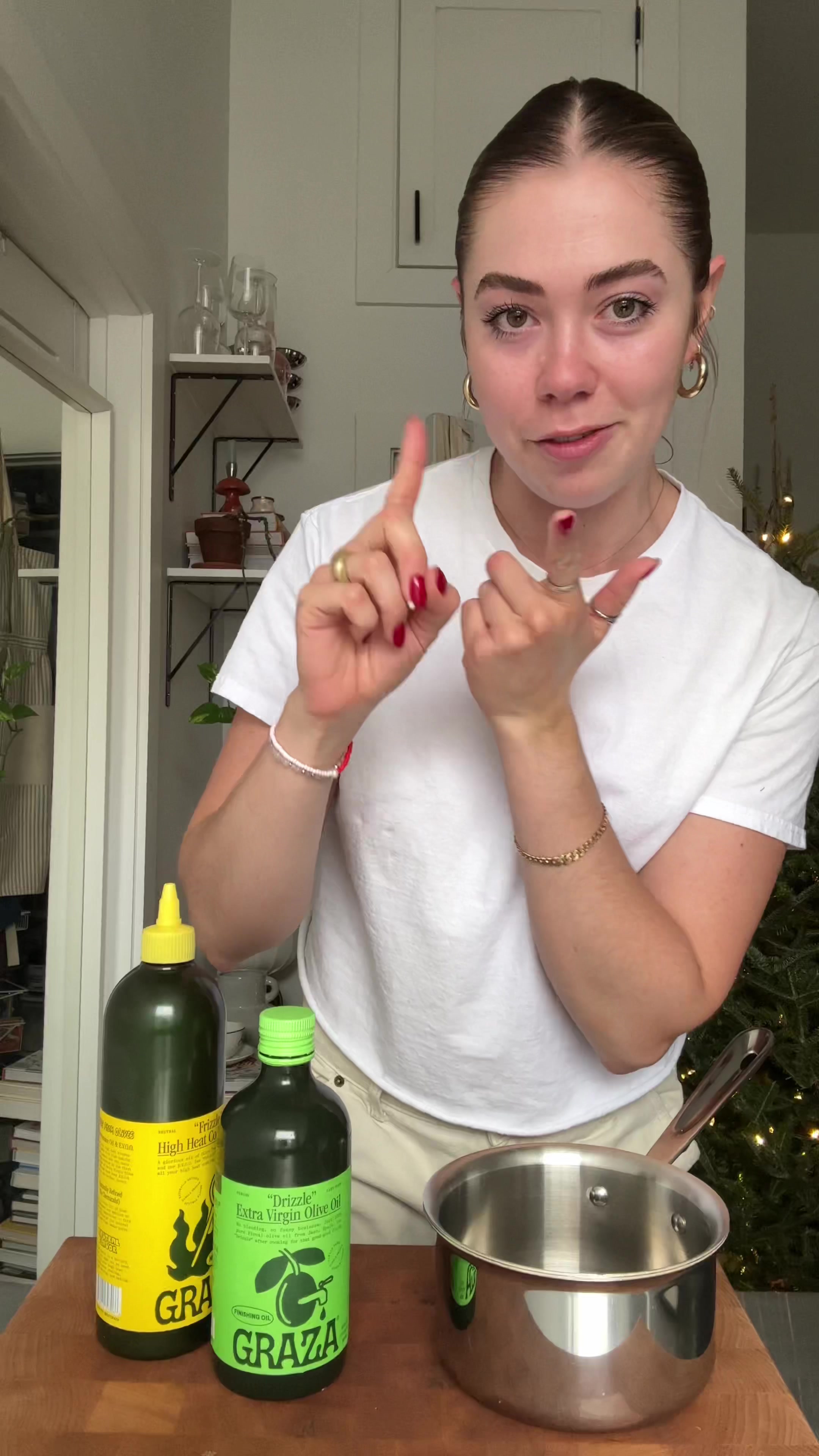 TikTok post by @redcurrantbakery for Graza. Caption reads: fluffy olive oil sea salt jam donuts with a @Graza....