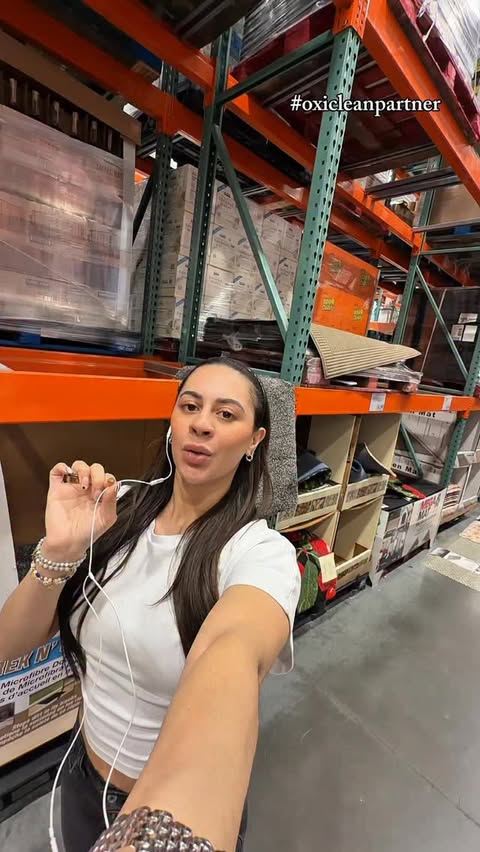 Instagram post by @em.loren_ for OxiClean. Caption reads: [...] Costco trip turns into a whole ordeal.....