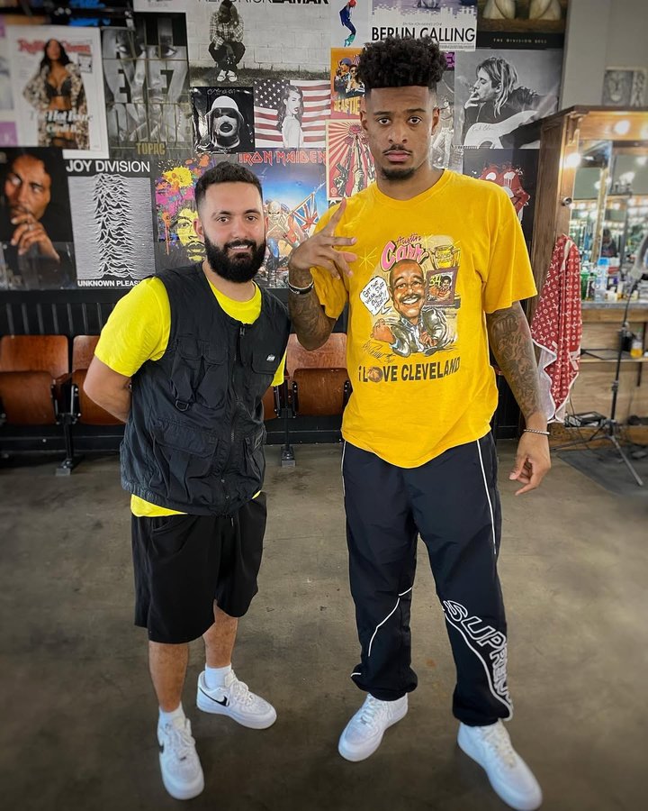 Instagram post by @cutsbymario for Barbershopconnect. Caption reads: ROLLED OUT THE RED CARPET FOR @yeahthatswood....