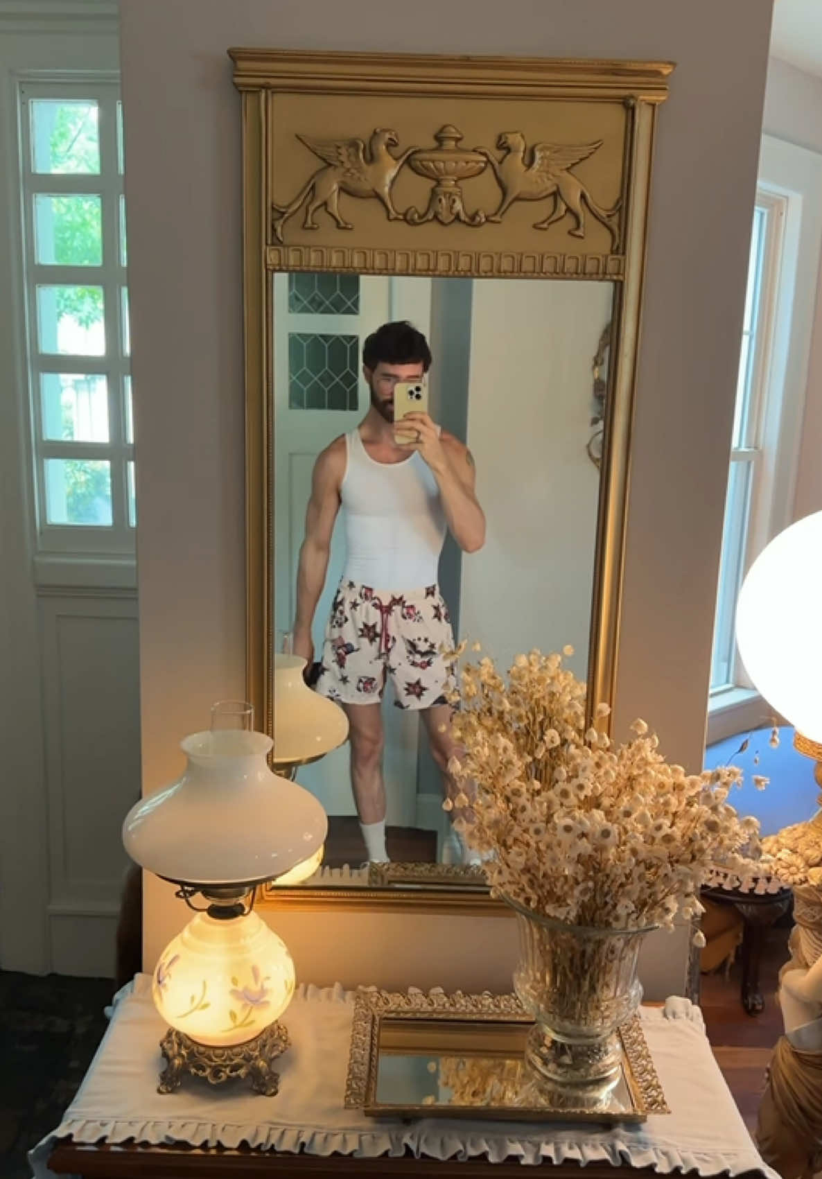 TikTok post by @georgeschirra for Maamgic. Caption reads: today’s gym-fit featuring my new @maamgic_official....