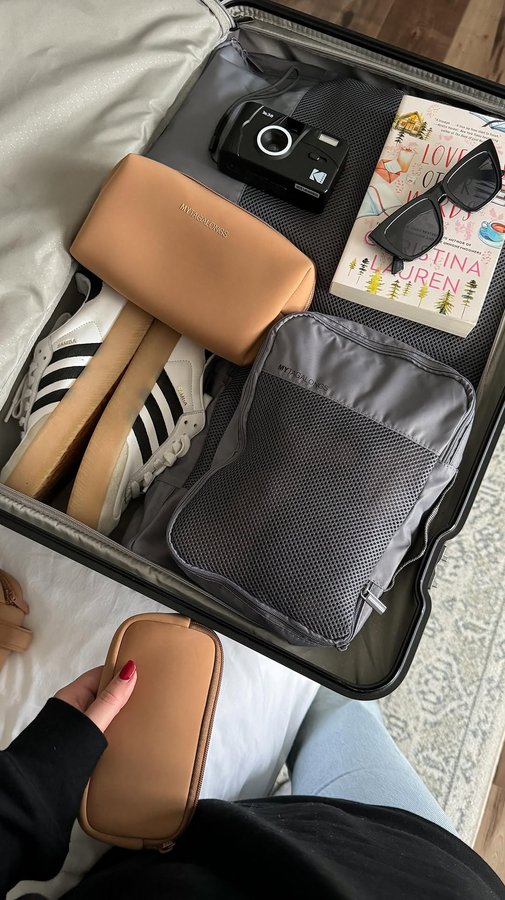 Instagram post by @breanneallarie for MYTAGALONGS. Caption reads: [...] suitcase organizers! This amazing....