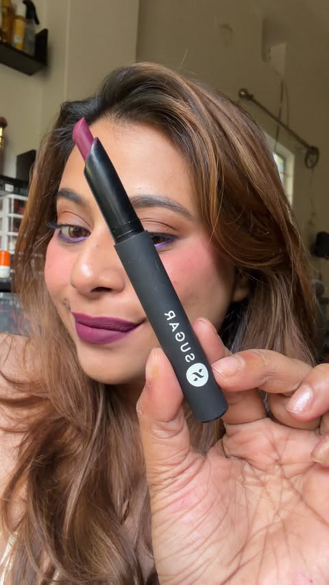 Instagram post by @_dishanib for SUGAR Cosmetics. Caption reads: [...] to buy 

[ plum lipstick, bold lipstick,....