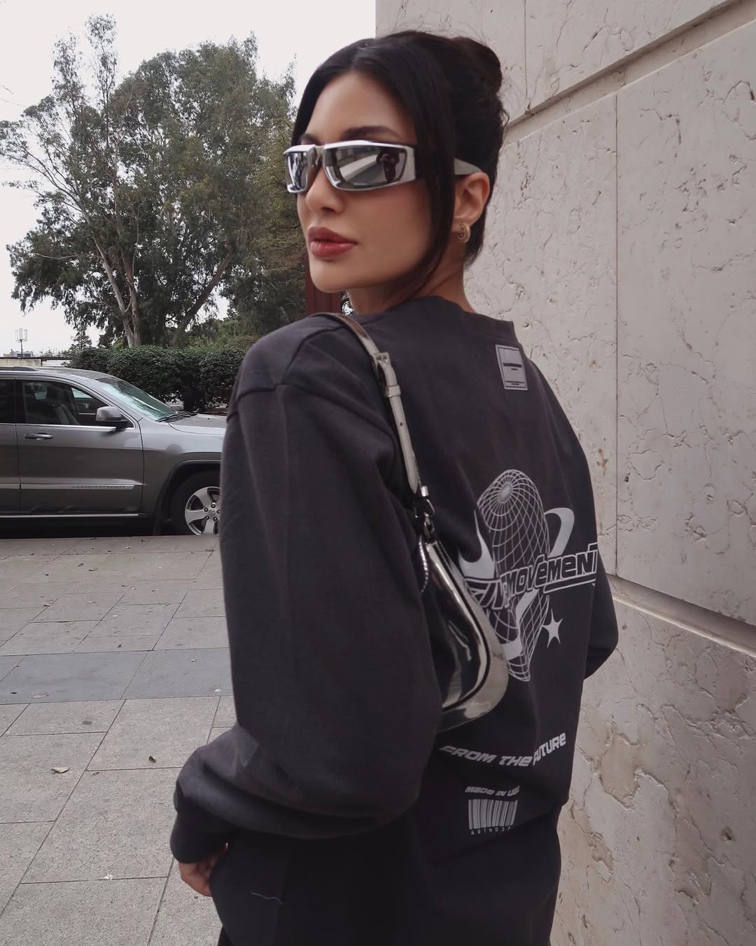 Instagram post by @aliceabdelaziz for The Giving Movement. Caption reads: #ad Sorry I don’t speak human 👽....