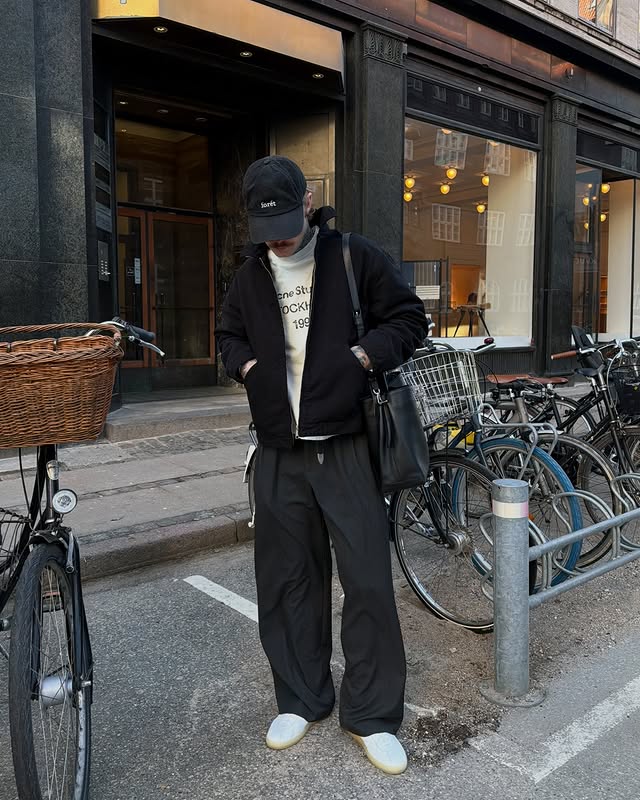 Instagram post by @kiimandersen for COPENHAGEN STUDIOS. Caption reads: Advertisement: a day in Copenhagen wearing....