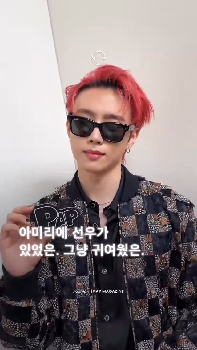 Instagram post by @kswoowu for AMIRI. Caption reads: 🦝 📸250626 SUNWOO x AmiriSS26 인간 아미리(@amiri)....