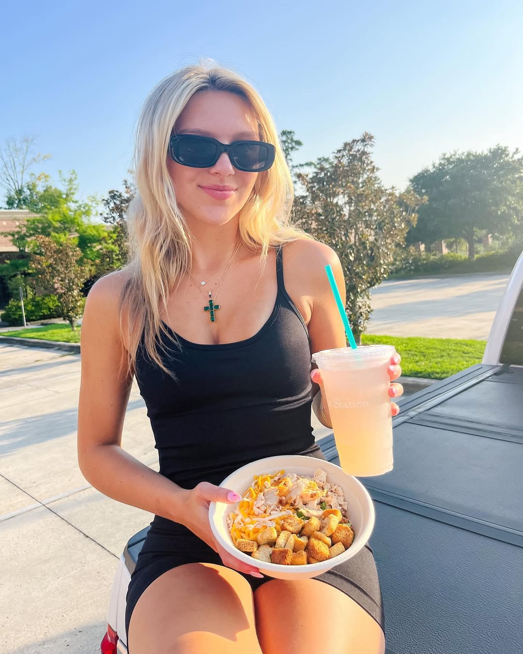 Instagram post by @emma_helton for Salad Station. Caption reads: watermelon lemonade🍉🍋>>>> #ad #saladstation....