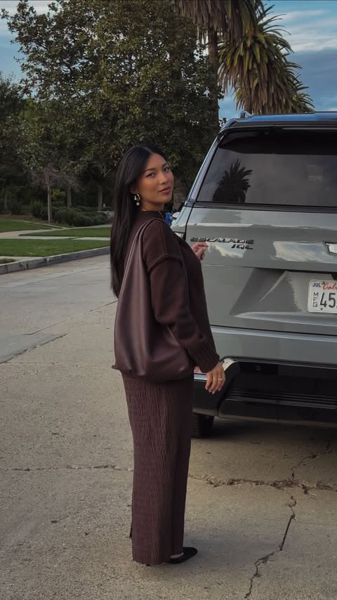 Instagram post by @stephhjelmeseth for Cadillac. Caption reads: [...] of car that moves with my day. #ad The....