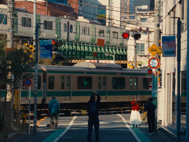 Instagram post by @emanueledimare_ for apple. Caption reads: #postcards from Tokyo #shotoniphone.