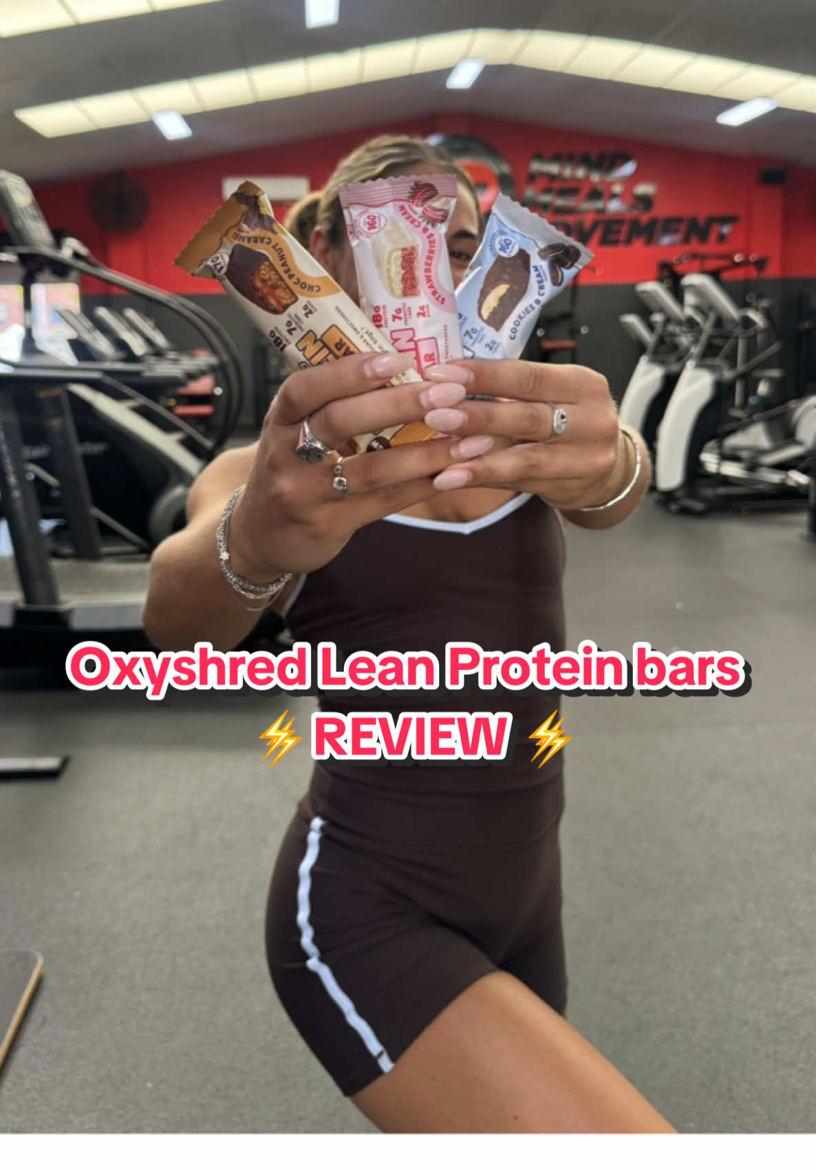 TikTok post by @maddy.sanli for Chemist Warehouse. Caption reads: [...] Protein Bars are now in store at @Chemist....