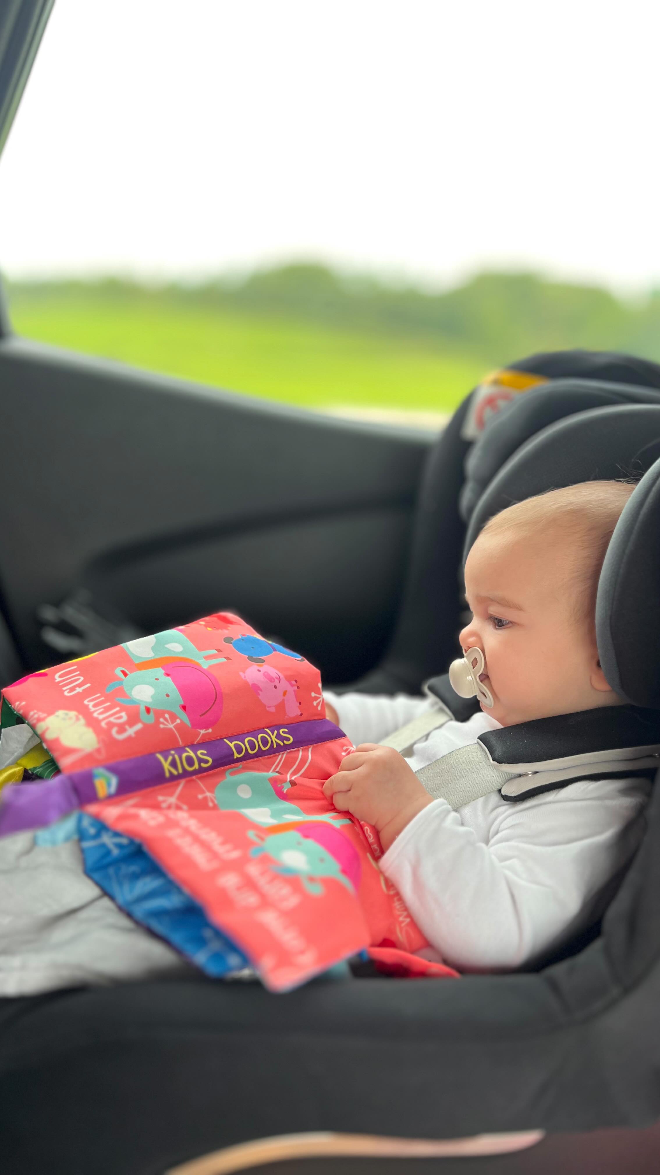Instagram post by @bellalimabarbosa for Montessori Generation. Caption reads: Who knew a little book could save our car trips?....