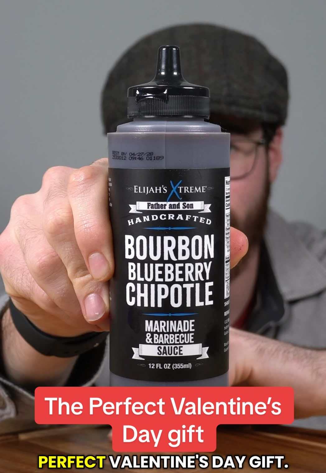 TikTok post by @aj_reviews_ for Elijah's Xtreme. Caption reads: [...] Chipotle Marinade and Barbecue Sauce....