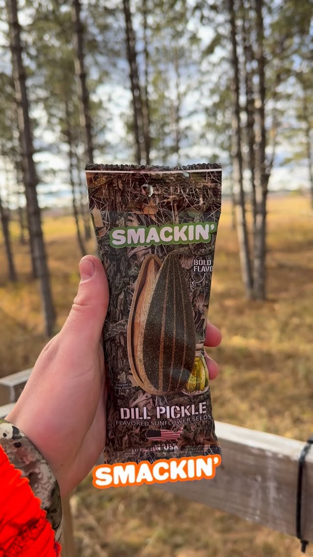 Instagram post by @cadenwenzelgolf for Smackin' Sunflower Seeds. Caption reads: SMACKIN’- The Official Deer Camp Snack Of....