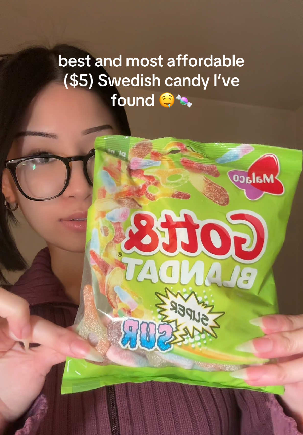TikTok post by @carewithmi for Scandycandy. Caption reads: [...] #candytok #chewycandy #sourcandy....