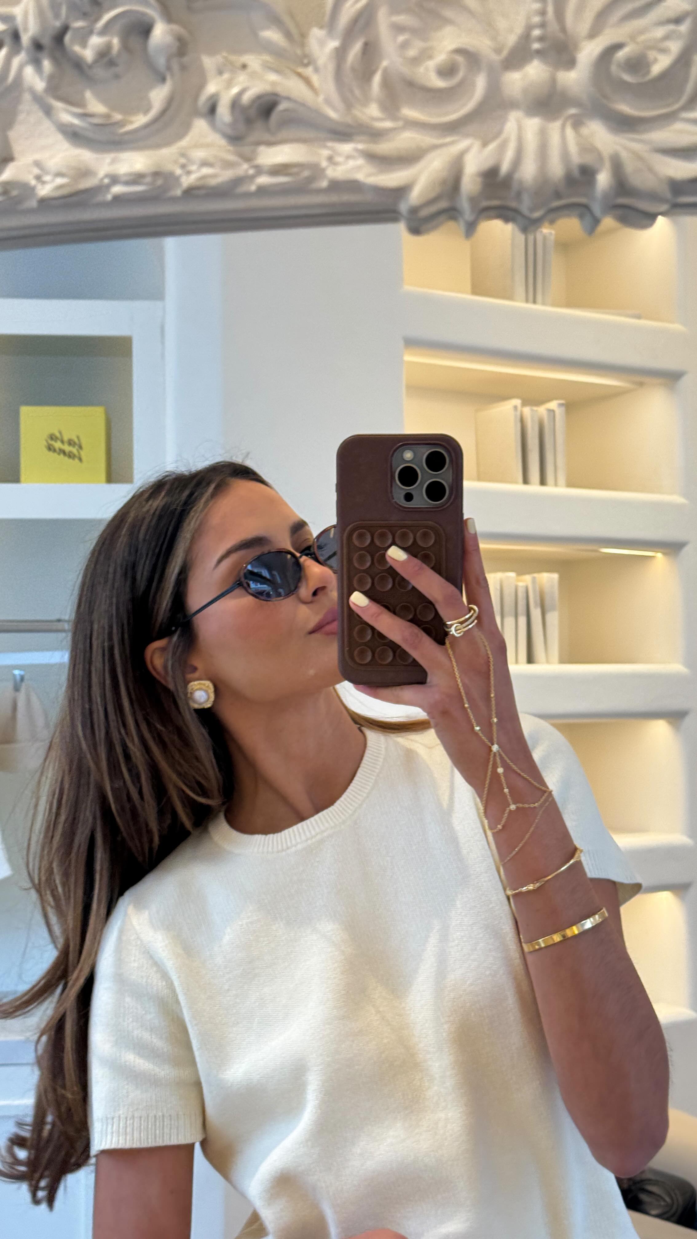 Instagram post by @lauravanessa_w for OGX Beauty. Caption reads: #ad Seeing my hair under a lens at the @ogx_beauty....