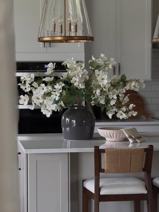 Instagram post by @homewithstephannie for Afloral. Caption reads: [...] required 💐 These stems from @afloral are my....