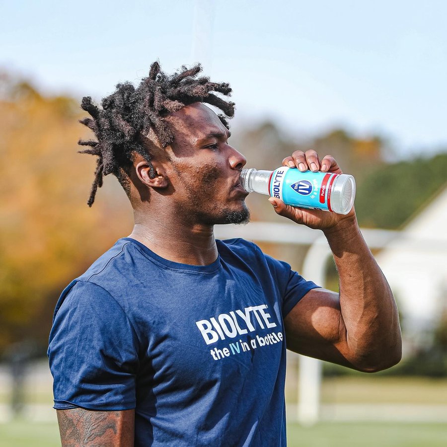 Instagram post by @raylenwilson for BIOLYTE. Caption reads: No matter who lines up across from us, it’s game....