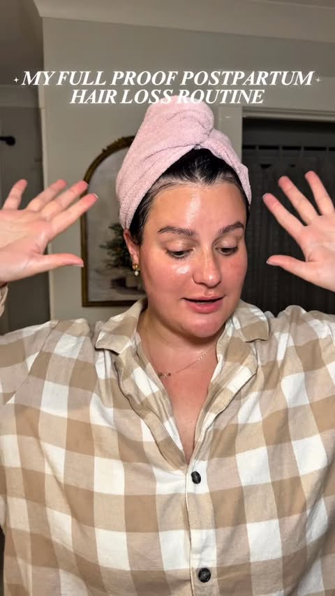 Instagram post by @taylorbosmann for OUAI. Caption reads: [...] full proof postpartum hair loss routine....