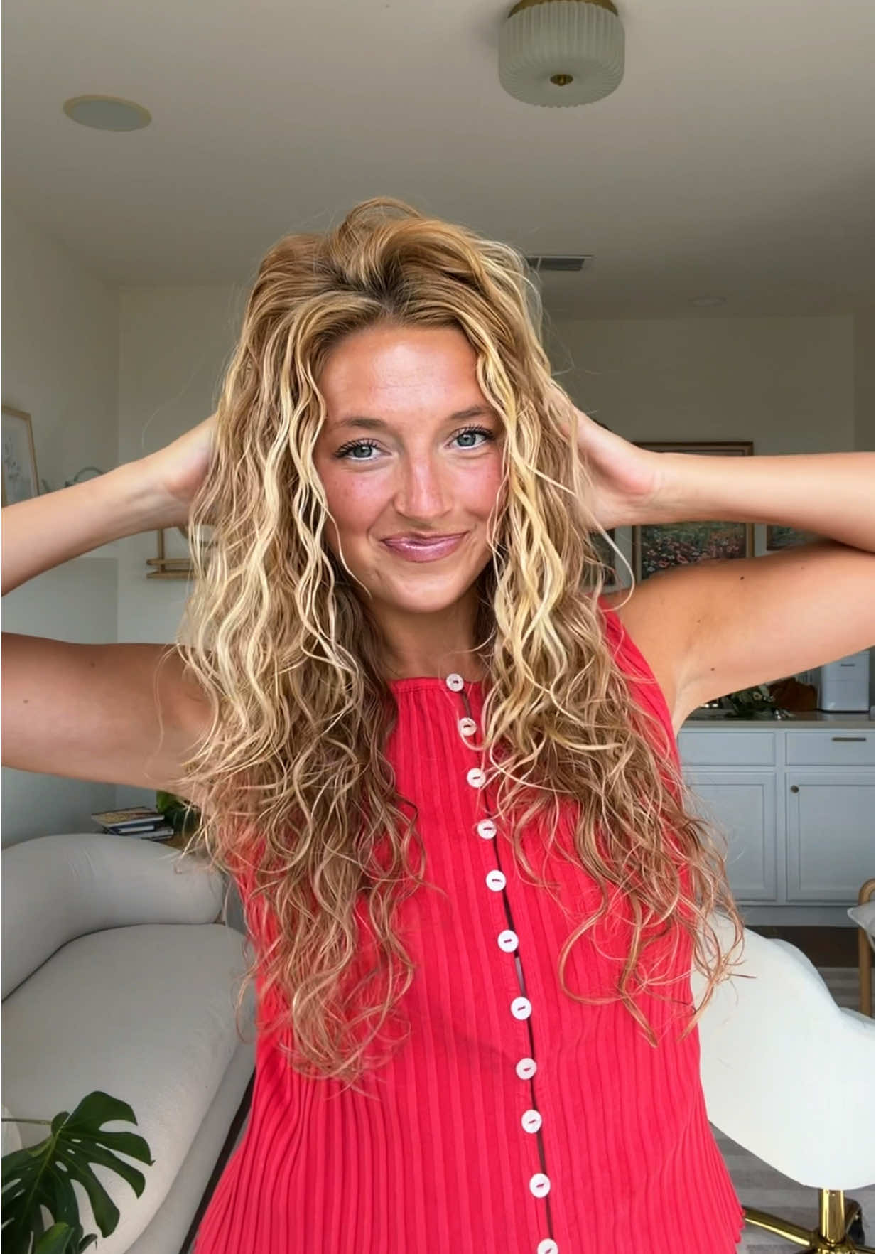 TikTok post by @itsgretawilson for OUAI. Caption reads: we’re so back 🧚🍓⭐️ product I used: @Dae Hair....