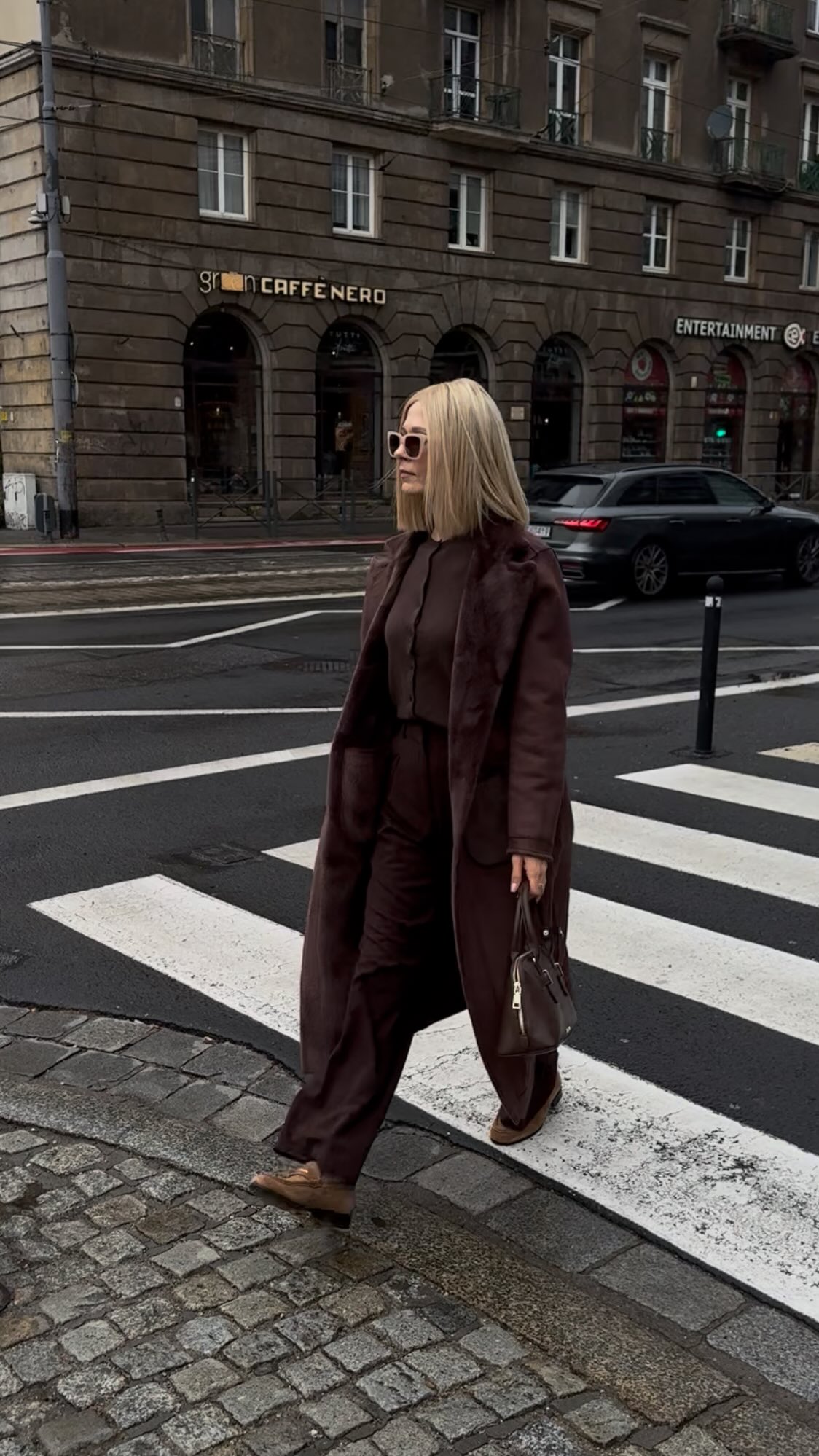 Instagram post by @aniarosiak_ for MODIVO. Caption reads: Brown is a new black z @modivo 

#Reklama #modivo....